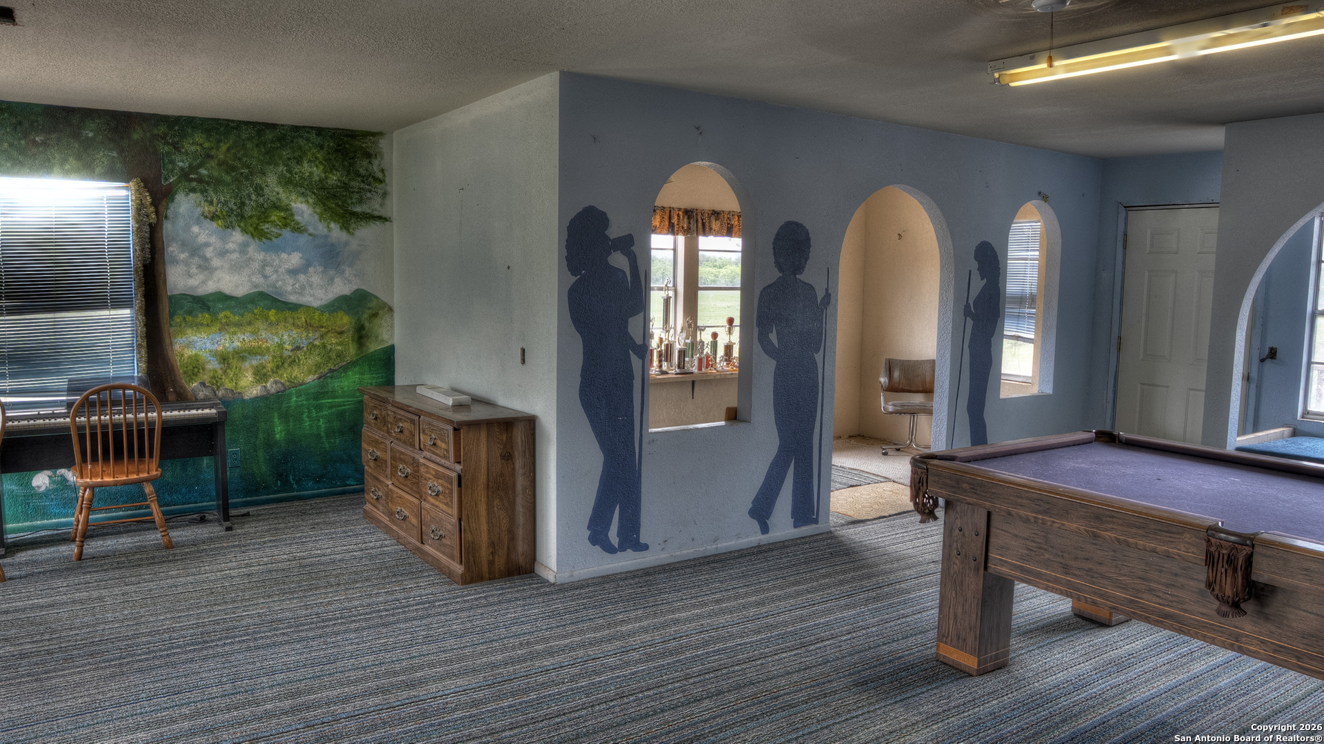 6623 Ranch Road 1120 Rio Frio, TX 78879 - Photo 24 of 25 a view of hall way with furniture and wooden floor
