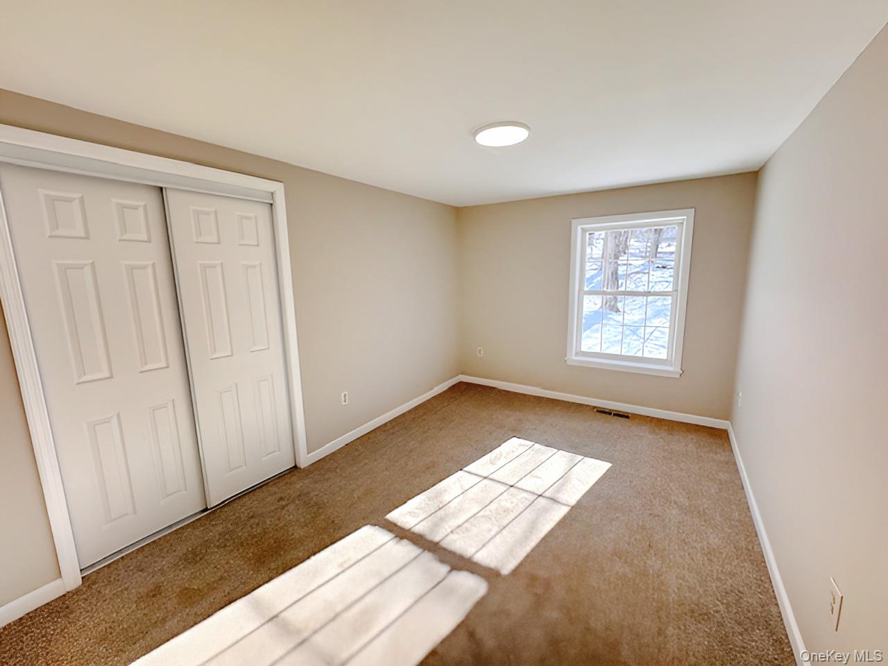 3 Glade Road Poughkeepsie, NY 12601 - Photo 12 of 19 a view of an empty room and window