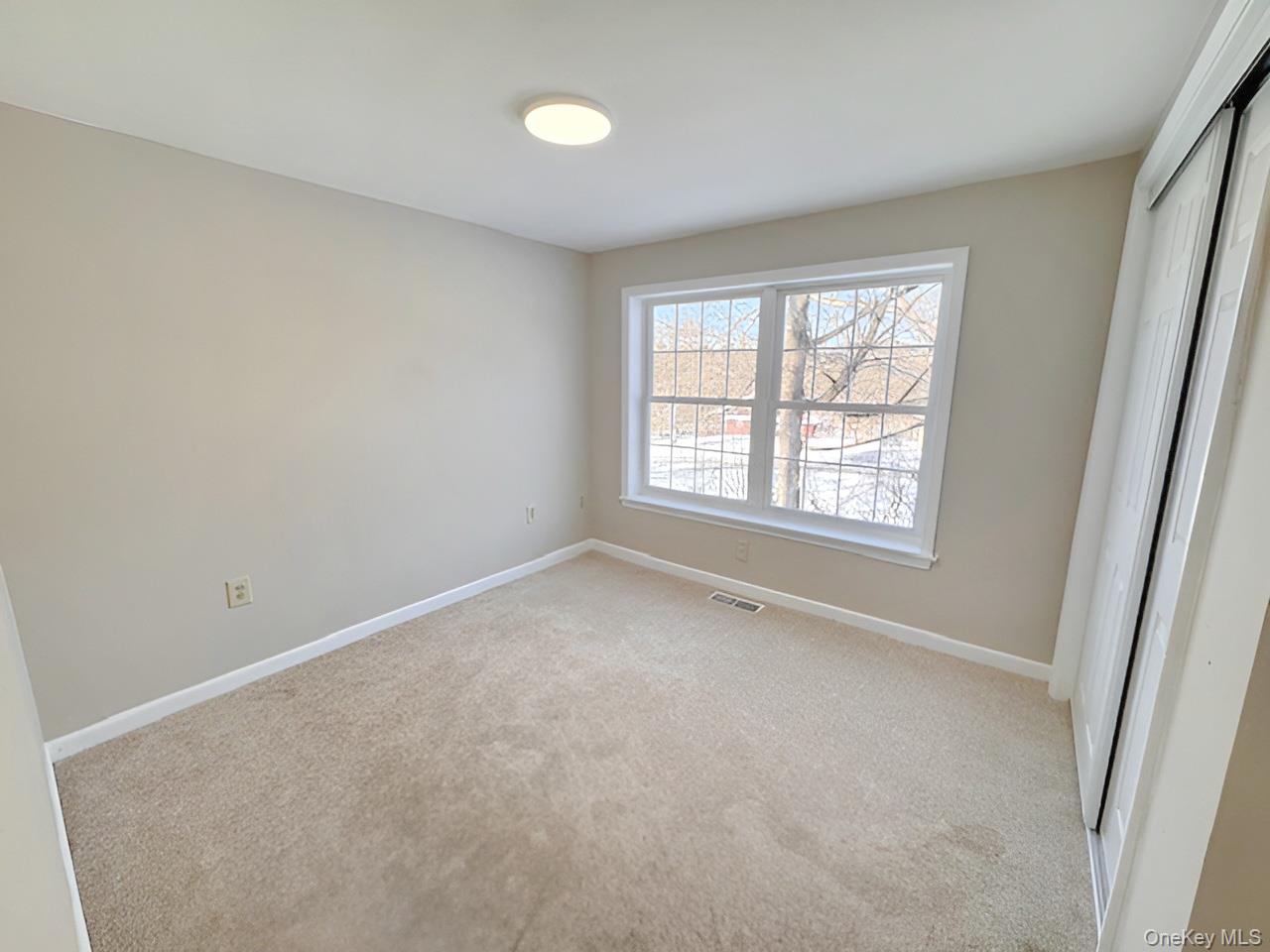 3 Glade Road Poughkeepsie, NY 12601 - Photo 13 of 19 an empty room with a window