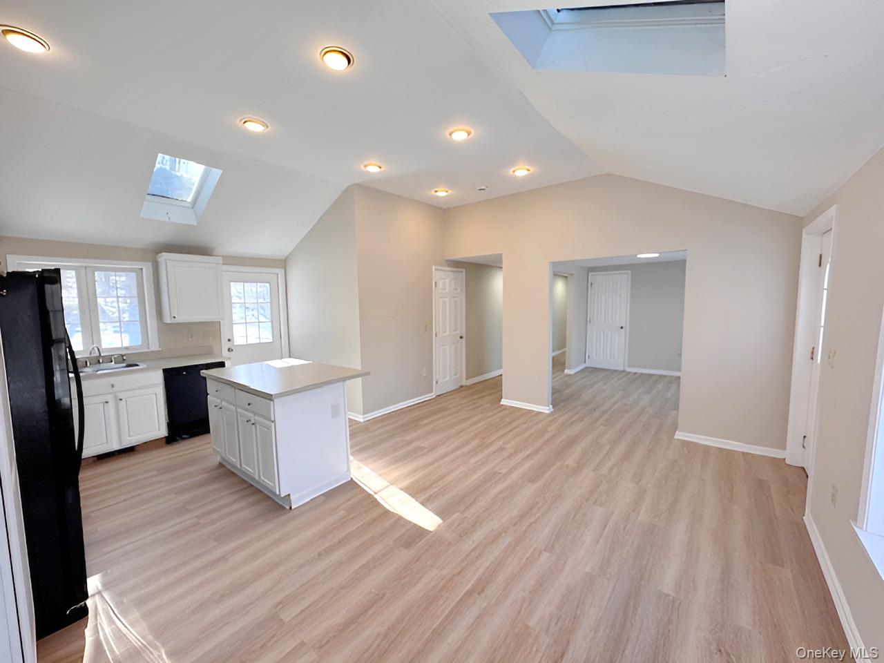 3 Glade Road Poughkeepsie, NY 12601 - Photo 5 of 19 a view of empty room with wooden floor and window