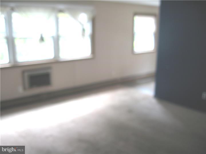 403 South Main Street, Unit C100 Doylestown, PA 18901 - Photo 9 of 12 Living Room