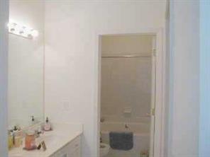 950 Jetton Street, Unit 1 Davidson, NC 28036 - Photo 6 of 8 a bathroom with a bathtub