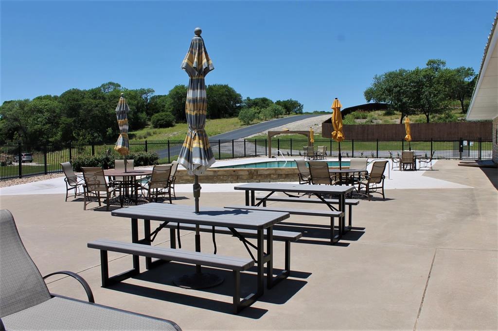 2-lots Ridgeline Drive Chico, TX 76431 - Photo 11 of 22 a view of a swimming pool with chairs in patio