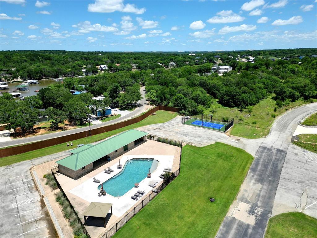 2-lots Ridgeline Drive Chico, TX 76431 - Photo 18 of 22 a view of yard with swimming pool and outdoor seating