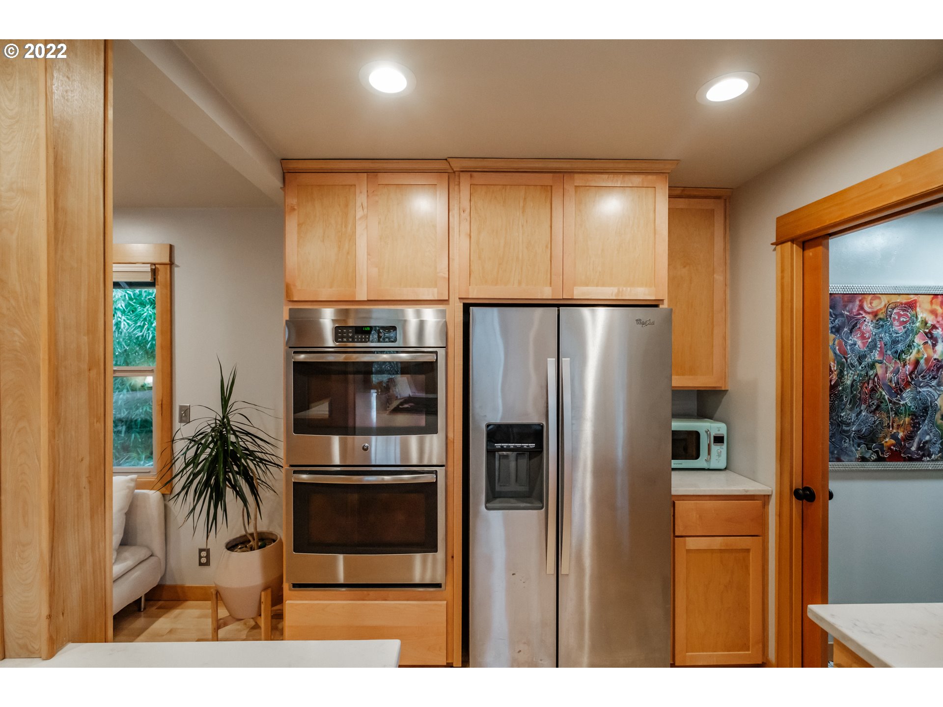240 West F Street Springfield, OR 97477 - Photo 14 of 32 a kitchen with stainless steel appliances a refrigerator and a stove