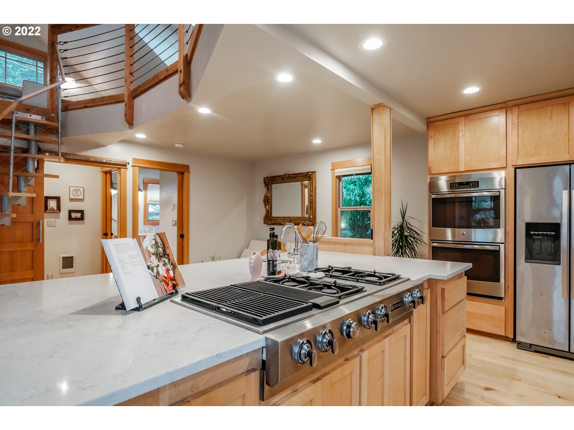 240 West F Street Springfield, OR 97477 - Photo 6 of 32 a kitchen with stainless steel appliances granite countertop a stove and a refrigerator