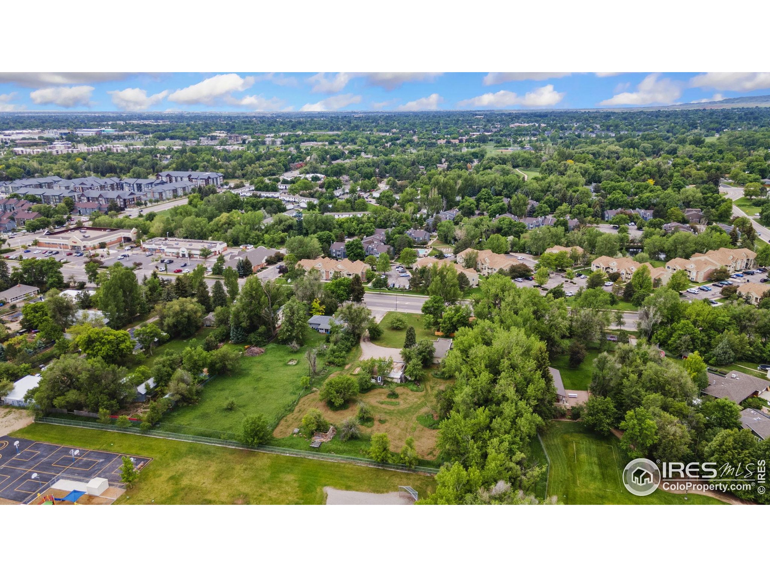 1304 West Prospect Road Fort Collins, CO 80526 - Photo 26 of 29 a view of a city with a mountain
