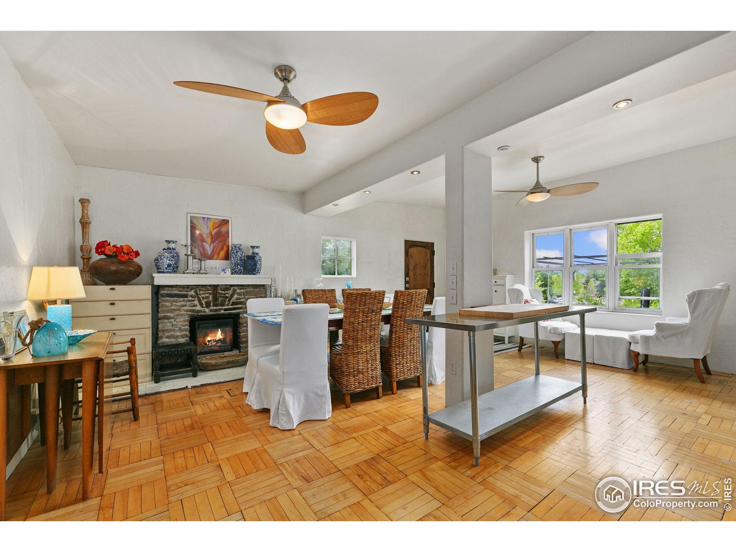 1304 West Prospect Road Fort Collins, CO 80526 - Photo 10 of 29 a living room with furniture and a fireplace