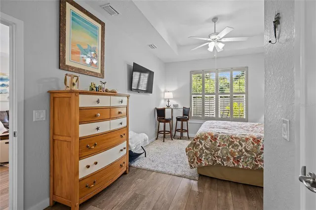 a bed room with a bed and a window