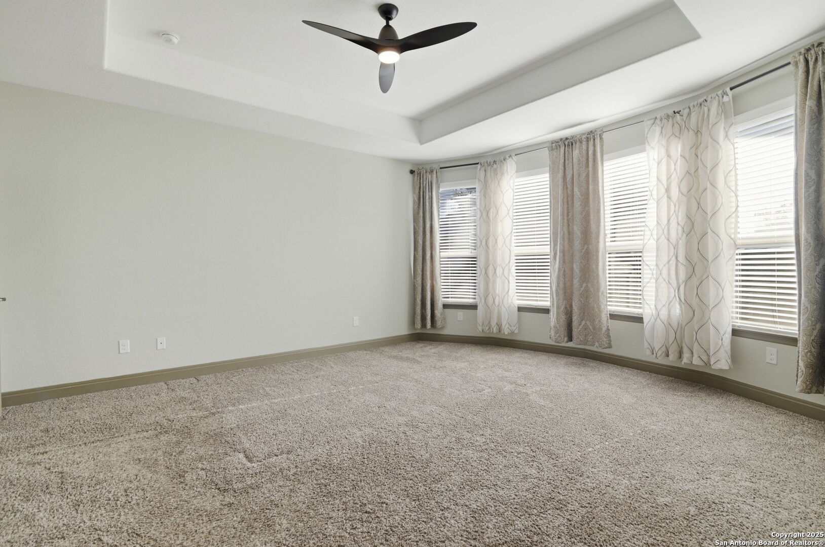 904 Turning Stone Cibolo, TX 78108 - Photo 14 of 35 an empty room with a empty space and a ceiling fan