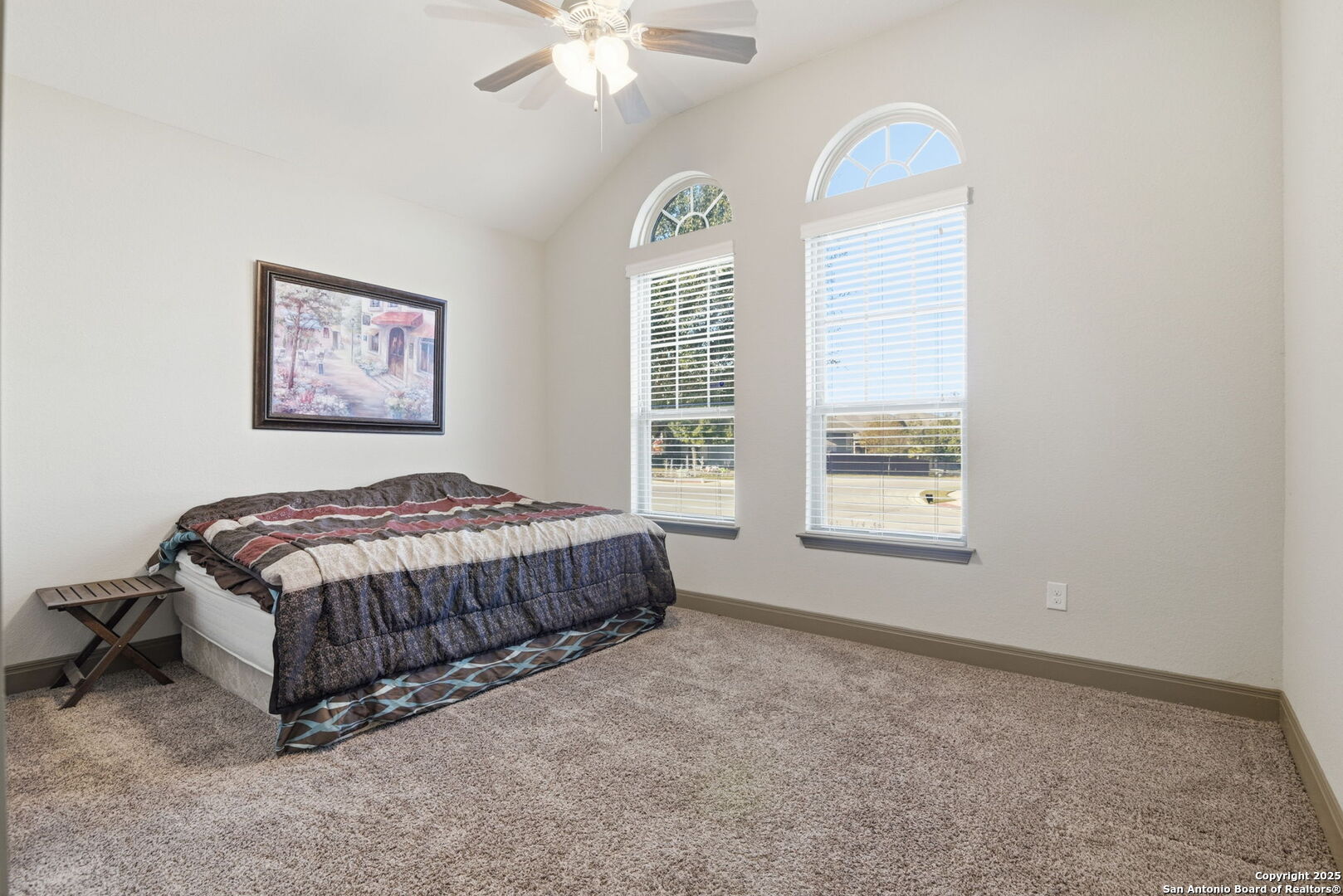904 Turning Stone Cibolo, TX 78108 - Photo 20 of 35 a spacious bedroom with a bed and a window