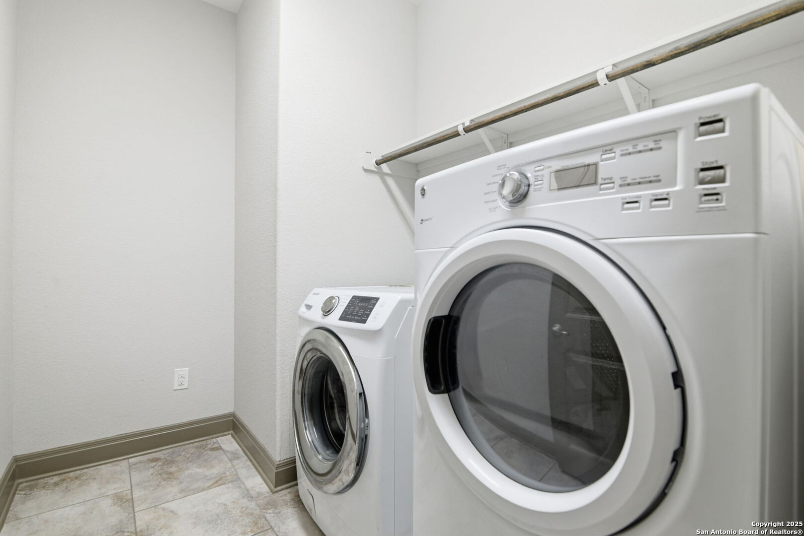 904 Turning Stone Cibolo, TX 78108 - Photo 33 of 35 a utility room with dryer and washer