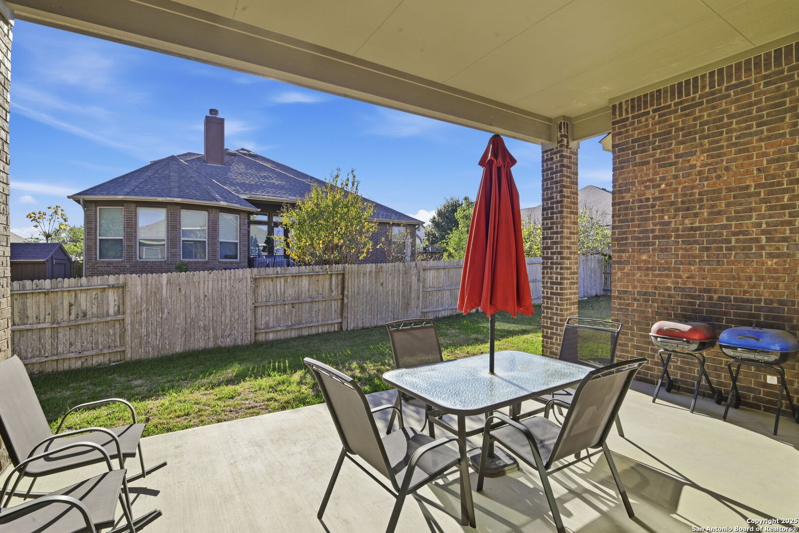904 Turning Stone Cibolo, TX 78108 - Photo 34 of 35 a view of a table and chairs in patio