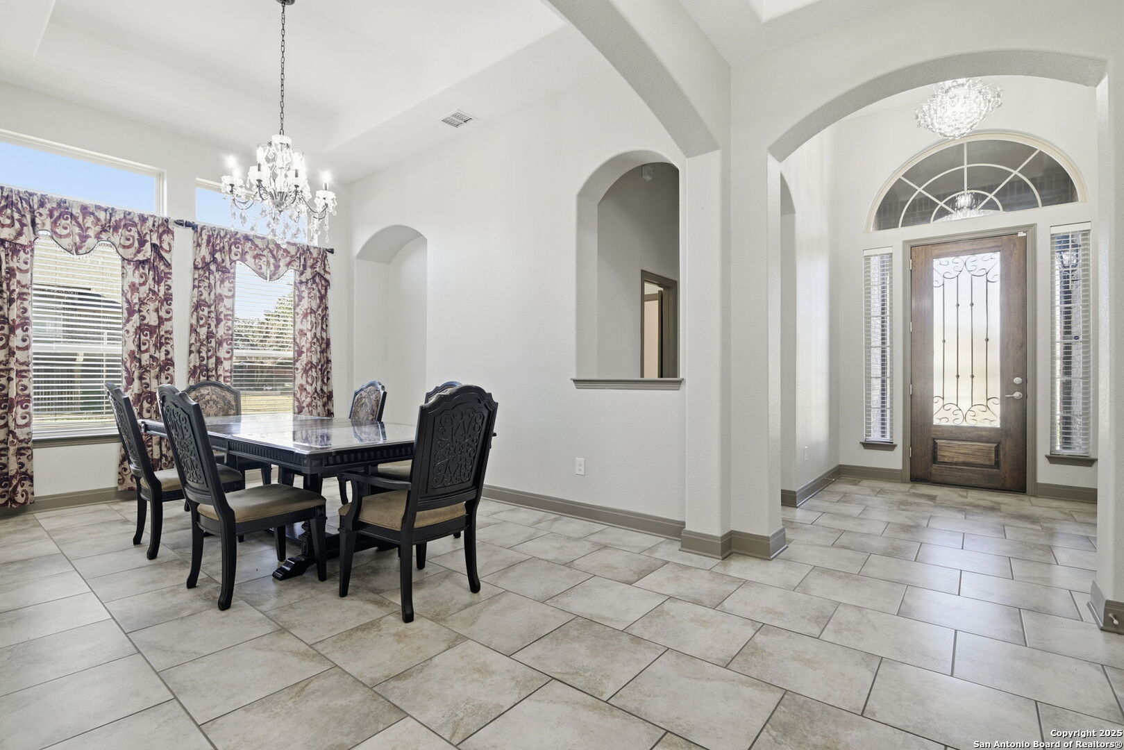 904 Turning Stone Cibolo, TX 78108 - Photo 4 of 35 a view of a dining room with furniture and chandelier