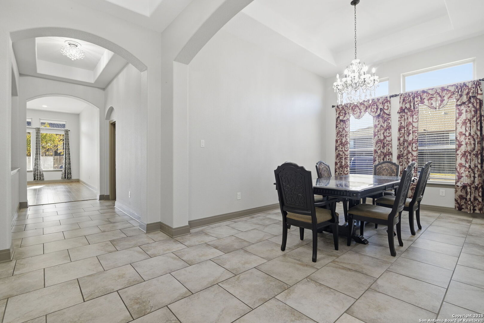 904 Turning Stone Cibolo, TX 78108 - Photo 5 of 35 a view of a dining room with furniture and chandelier