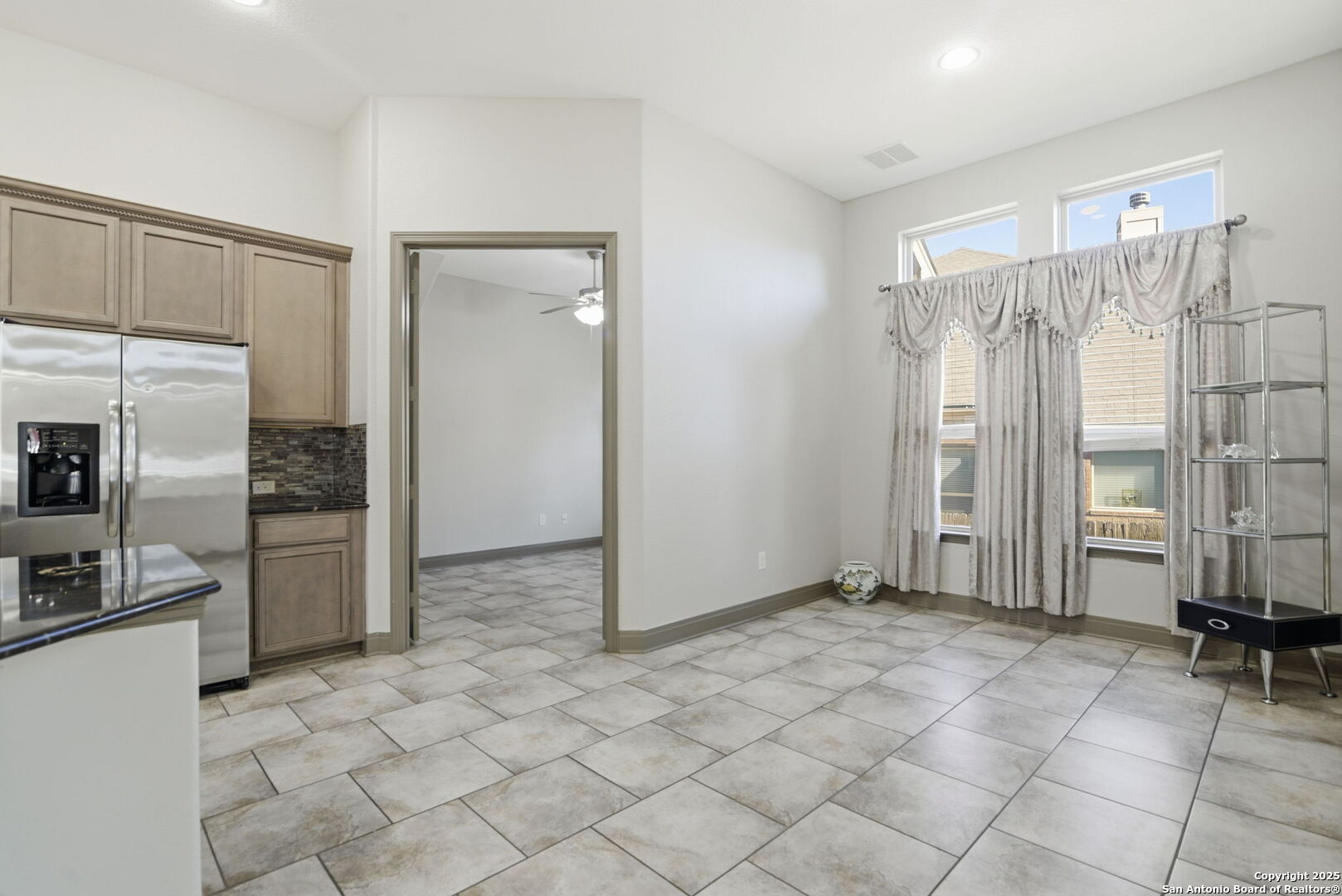 904 Turning Stone Cibolo, TX 78108 - Photo 10 of 35 a view of kitchen with furniture and refrigerator