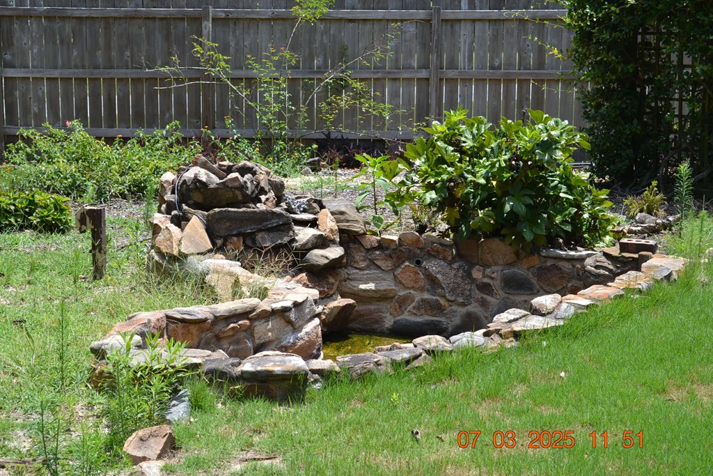 13642 Macon Road Upatoi, GA 31829 - Photo 24 of 34 a garden with lots of trees