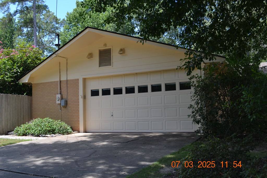 13642 Macon Road Upatoi, GA 31829 - Photo 31 of 34 a view of a white house with a yard