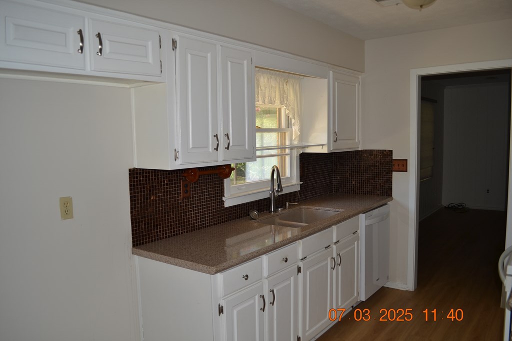 13642 Macon Road Upatoi, GA 31829 - Photo 9 of 34 a bathroom with a sink and a mirror