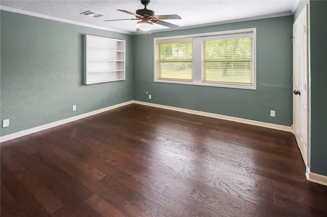 a bathroom with a granite countertop sink a mirror and a