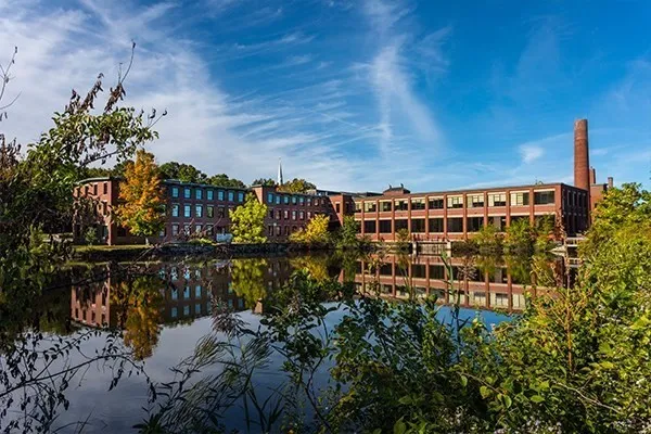 a view of a lake with a building in the background