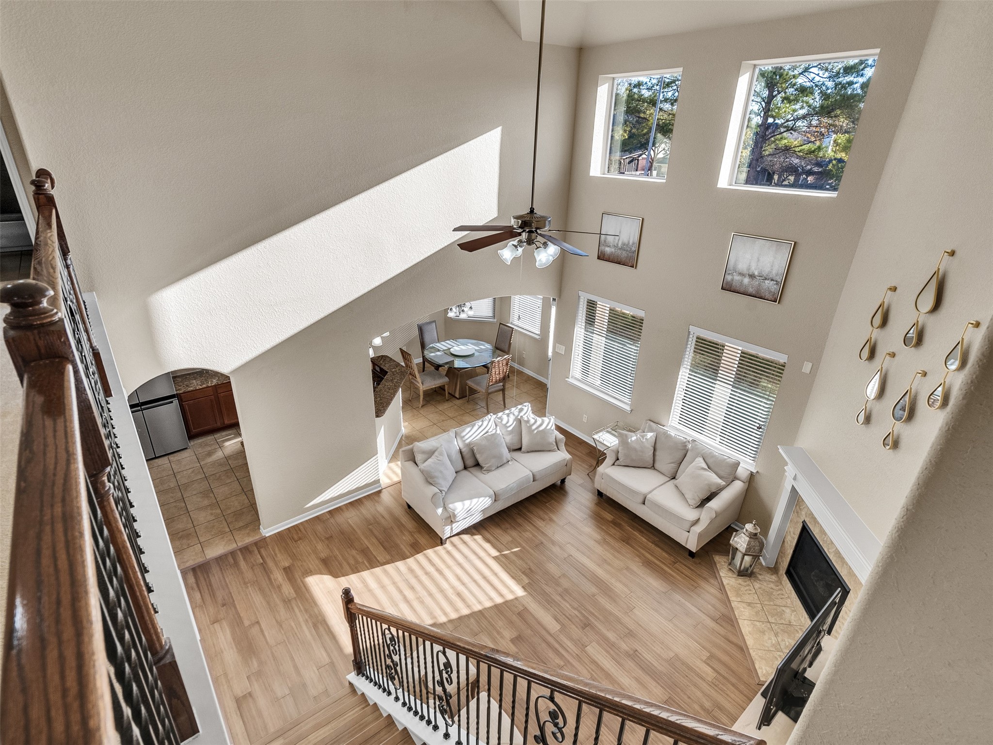 522 Summer Mist Lane Rosenberg, TX 77469 - Photo 36 of 36 View from the top! Look at that amazing natural light and open floor plan. This home is all about space, style, and flow