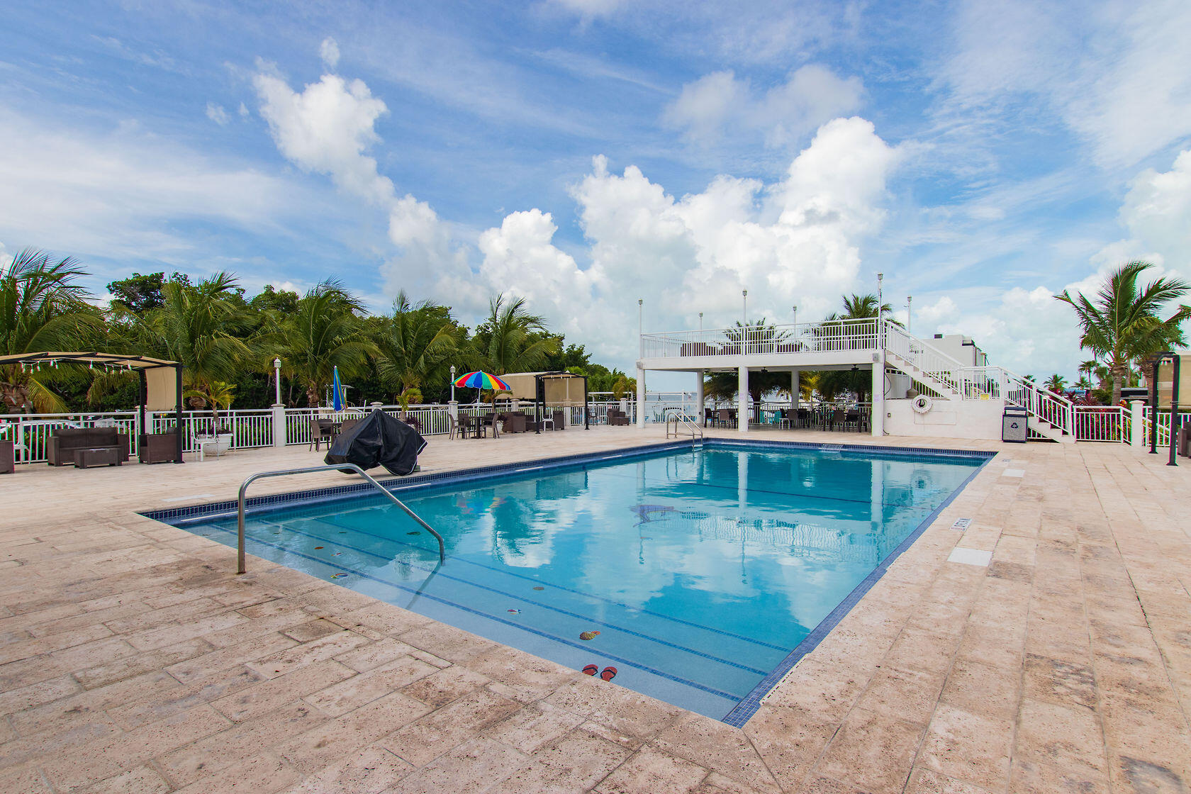 325 Calusa Street, Unit 234 Key Largo, FL 33037 - Photo 29 of 46 swimming pool view with two chairs