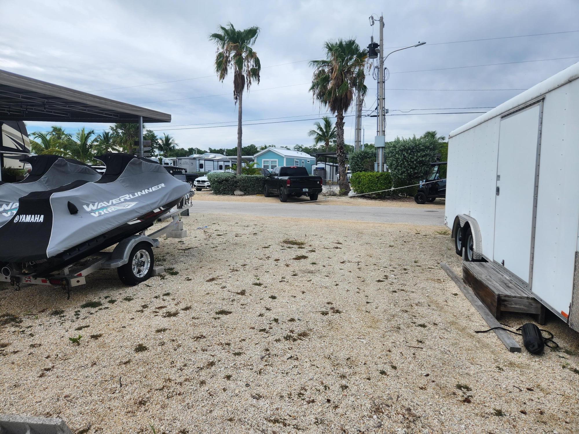 325 Calusa Street, Unit 234 Key Largo, FL 33037 - Photo 6 of 46 a view of a backyard with a sitting area