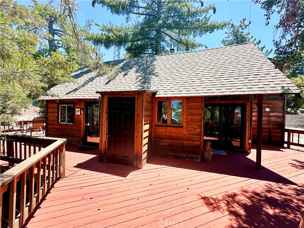 24387 Rocky Point Road Idyllwild, CA 92549 - Photo 17 of 29 a patio with table and chairs