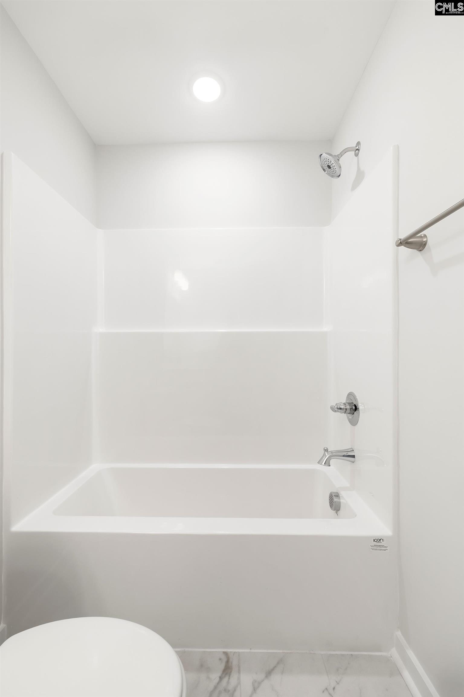 32 Fawn Spot Court Elgin, SC 29045 - Photo 25 of 28 a bathroom with a bathtub and a toilet