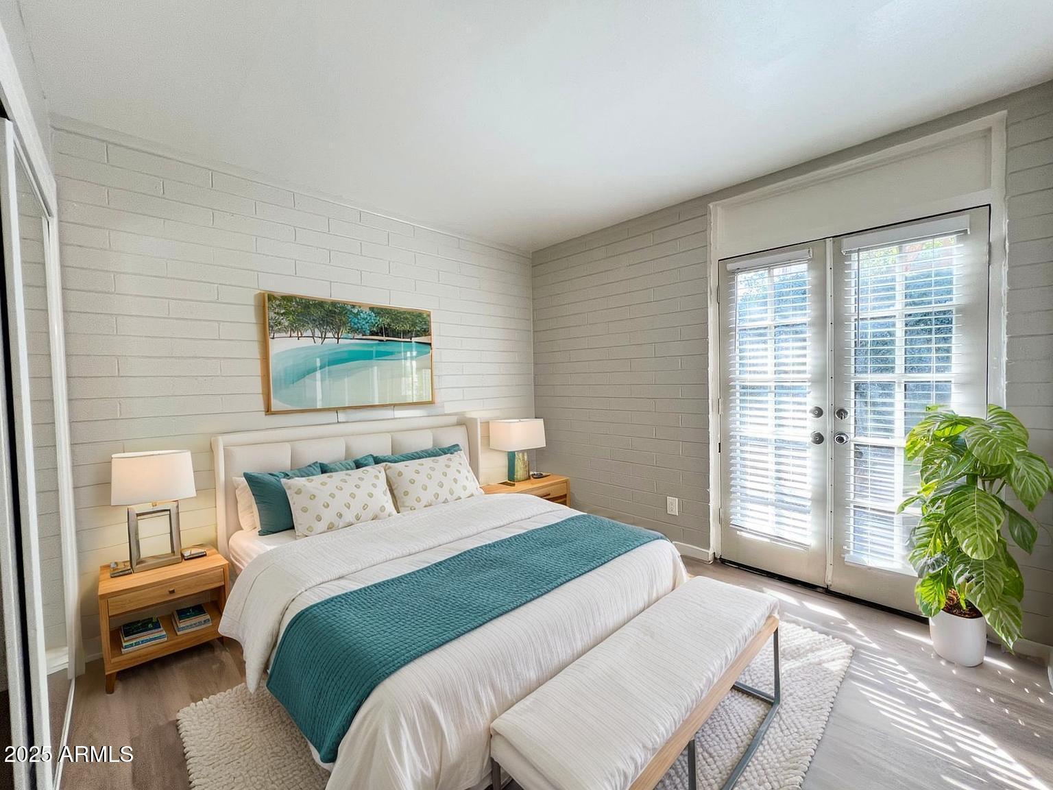 626 South Wilson Street Tempe, AZ 85281 - Photo 11 of 23 a bedroom with a balcony a large bed and a window