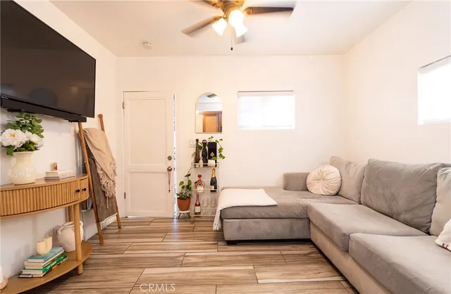 a kitchen with granite countertop a sink and a stove top oven