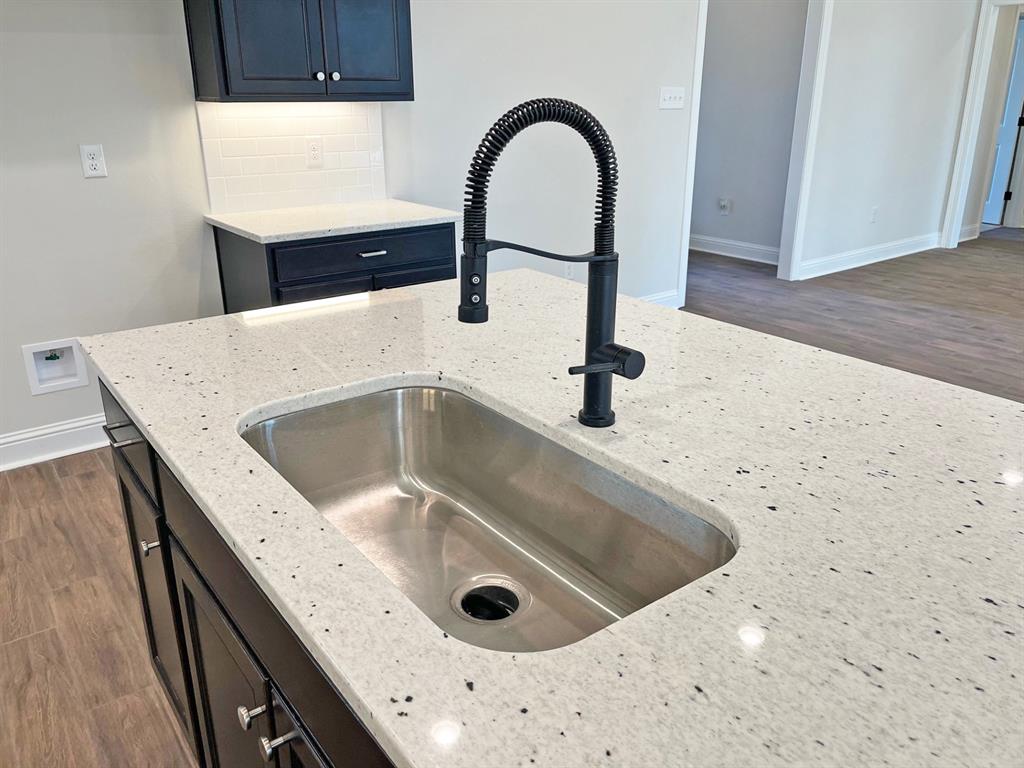 187 Lessie Drive Stonewall, LA 71078 - Photo 10 of 29 a close view of sink and tap