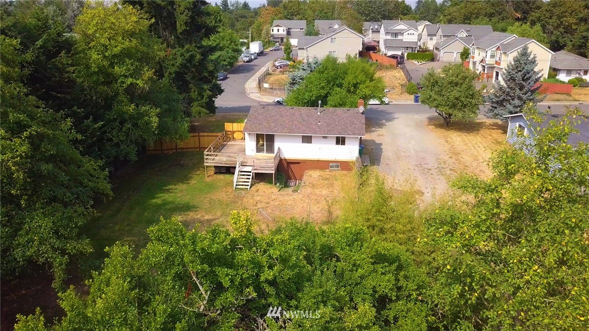 16618 113th Avenue Southeast Renton, WA 98055 - Photo 3 of 24 an aerial view of residential house with outdoor space and swimming pool