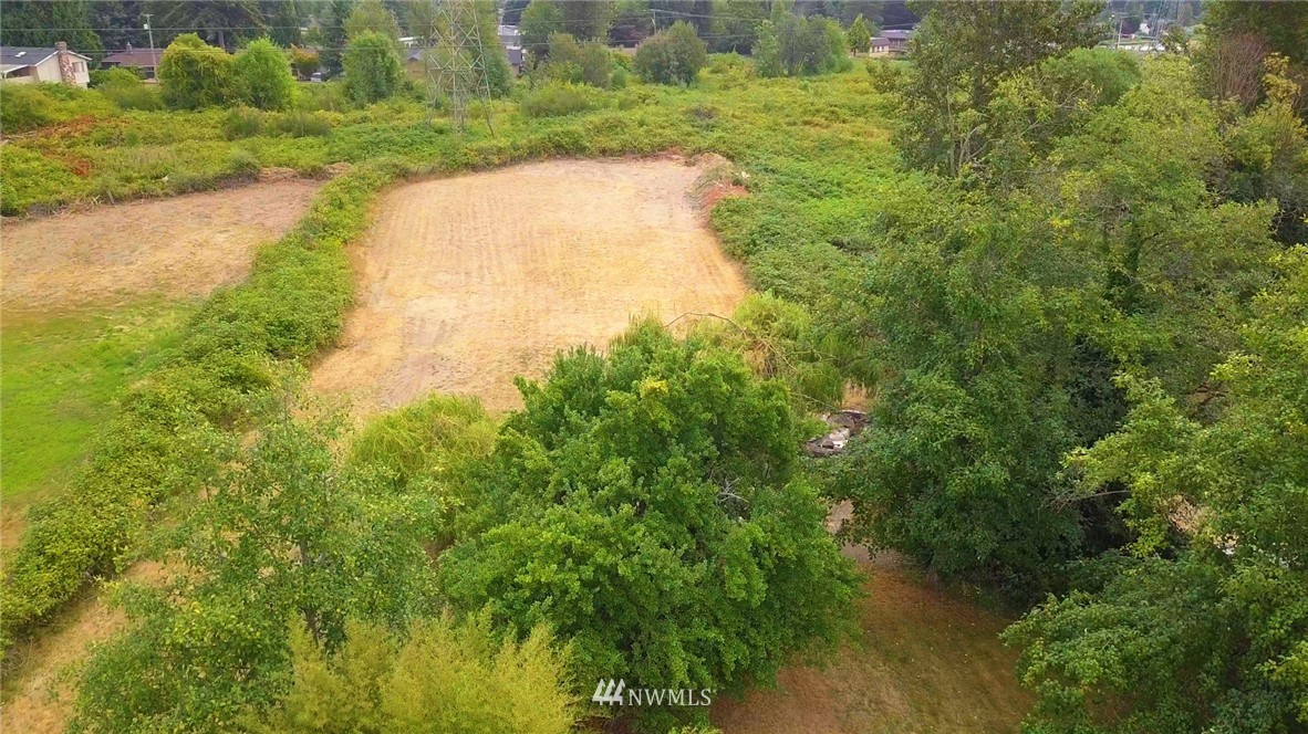 16618 113th Avenue Southeast Renton, WA 98055 - Photo 5 of 24 a view of a lake with a yard