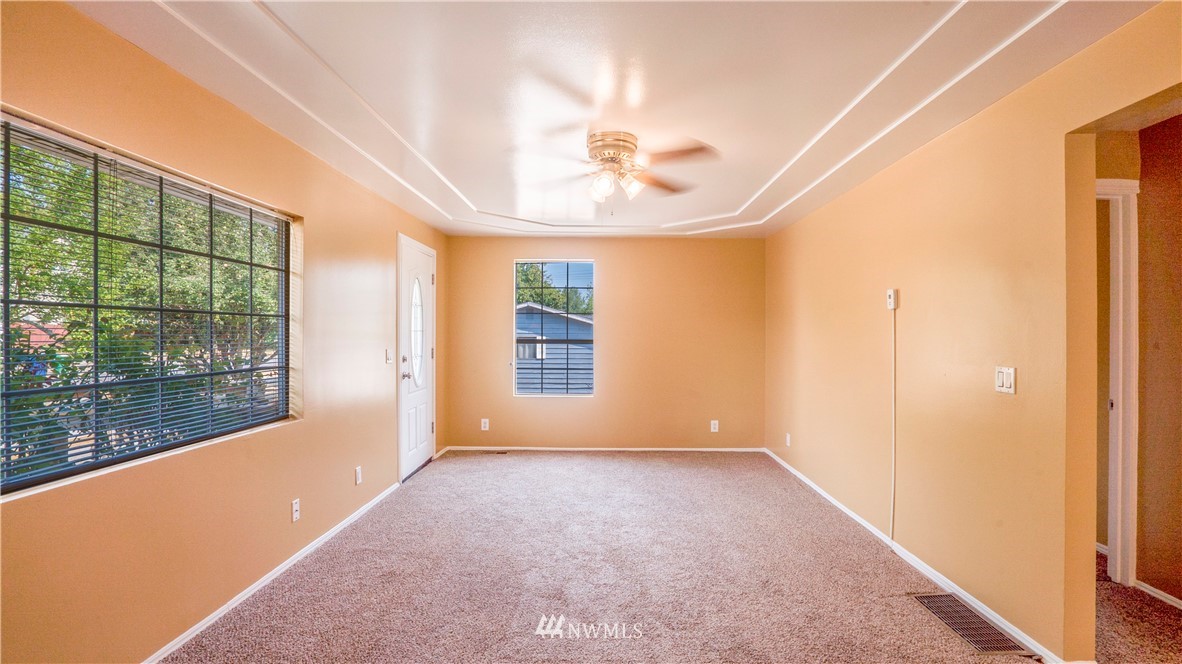 16618 113th Avenue Southeast Renton, WA 98055 - Photo 8 of 24 a view of a room with a large window