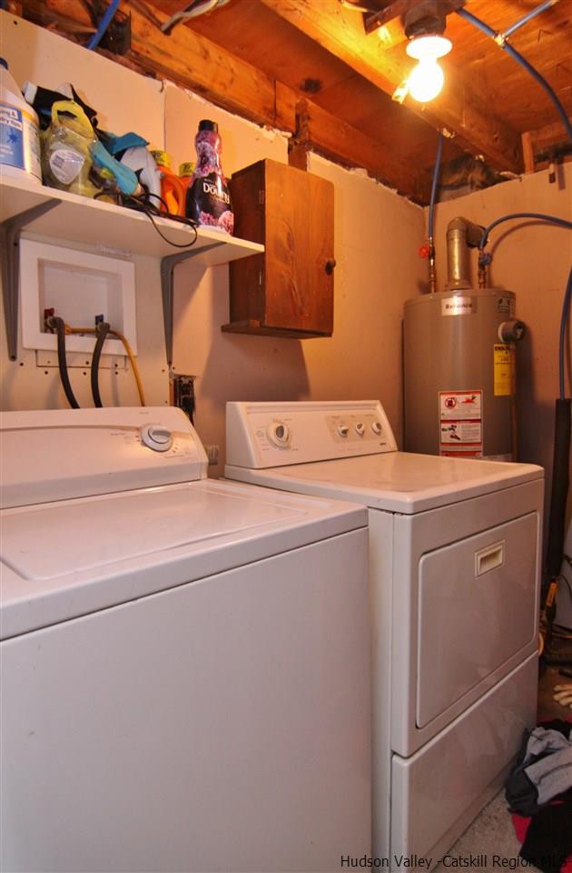 95 Pine Avenue Catskill, NY 12463 - Photo 7 of 10 a utility room with dryer and washer