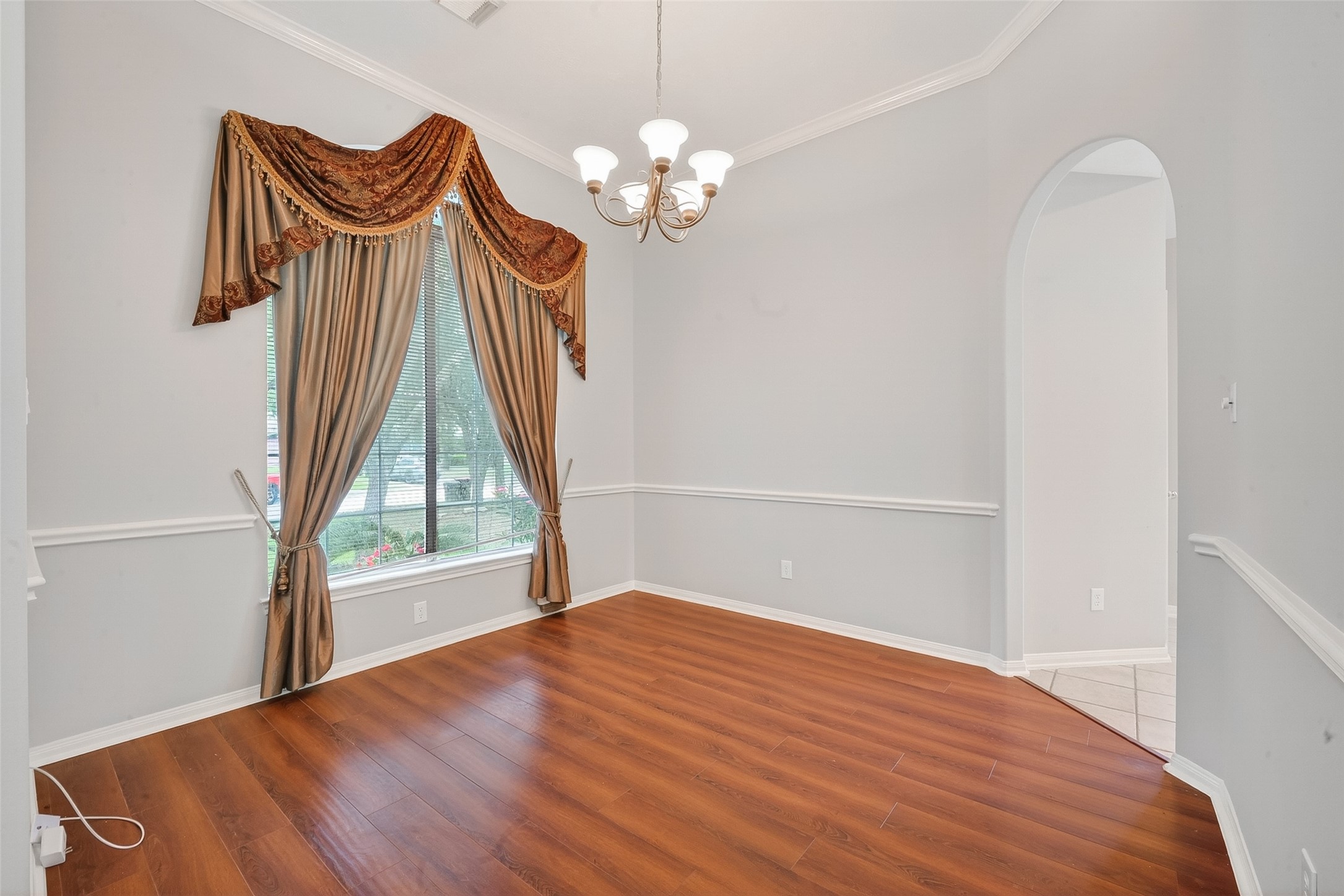 14308 Rocky Briar Lane Rosharon, TX 77583 - Photo 6 of 46 a view of empty room with wooden floor and fan