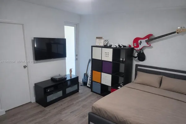 a bathroom with a bathtub and toilet