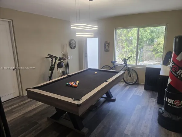 a view of workspace with wooden floor