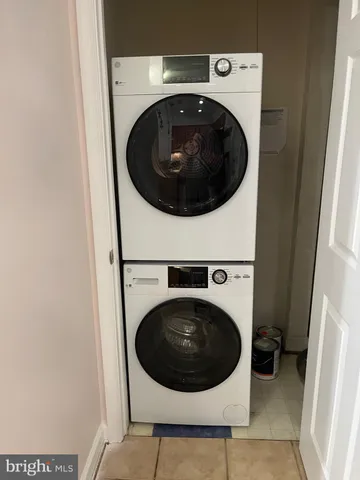a bathroom that has a glass shower door
