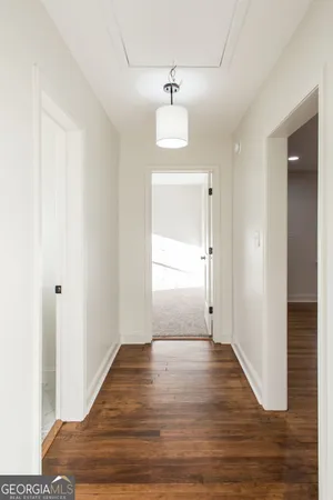a view of entryway with wooden floor