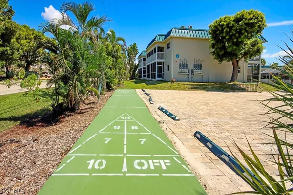 a view of swimming pool with a yard
