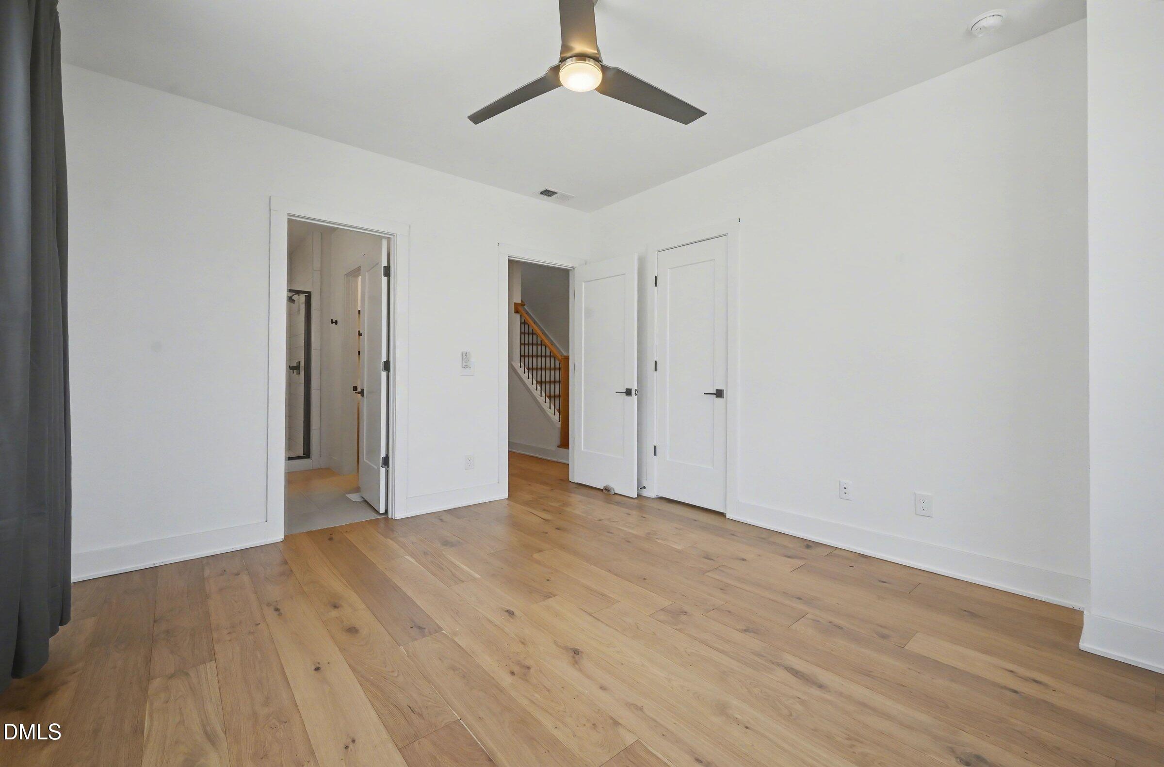 528 North Roxboro Street Durham, NC 27701 - Photo 18 of 26 a view of an empty room with wooden floor