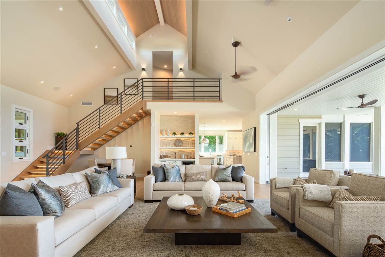 40 Hale Pili Way, Unit 15 Haiku, HI 96708 - Photo 9 of 27 a living room with furniture or couches and a potted plant