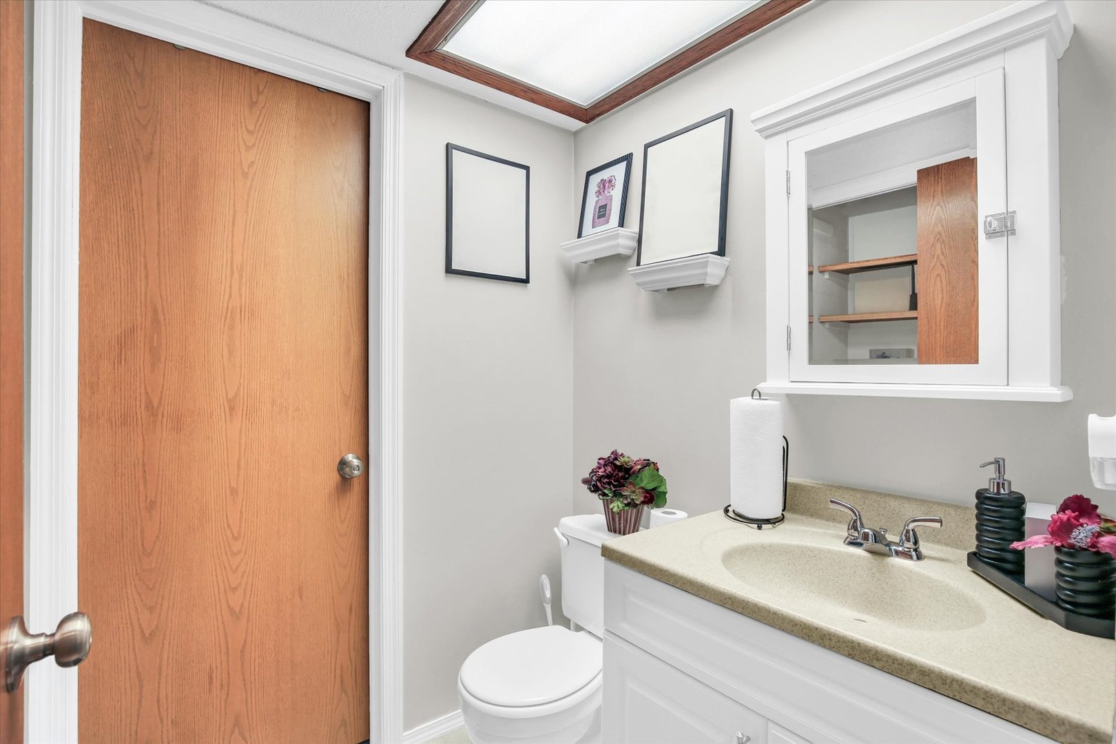 1802 Beck Drive, Unit 7 Urbana, IL 61802 - Photo 18 of 26 a bathroom with a sink toilet and vanity