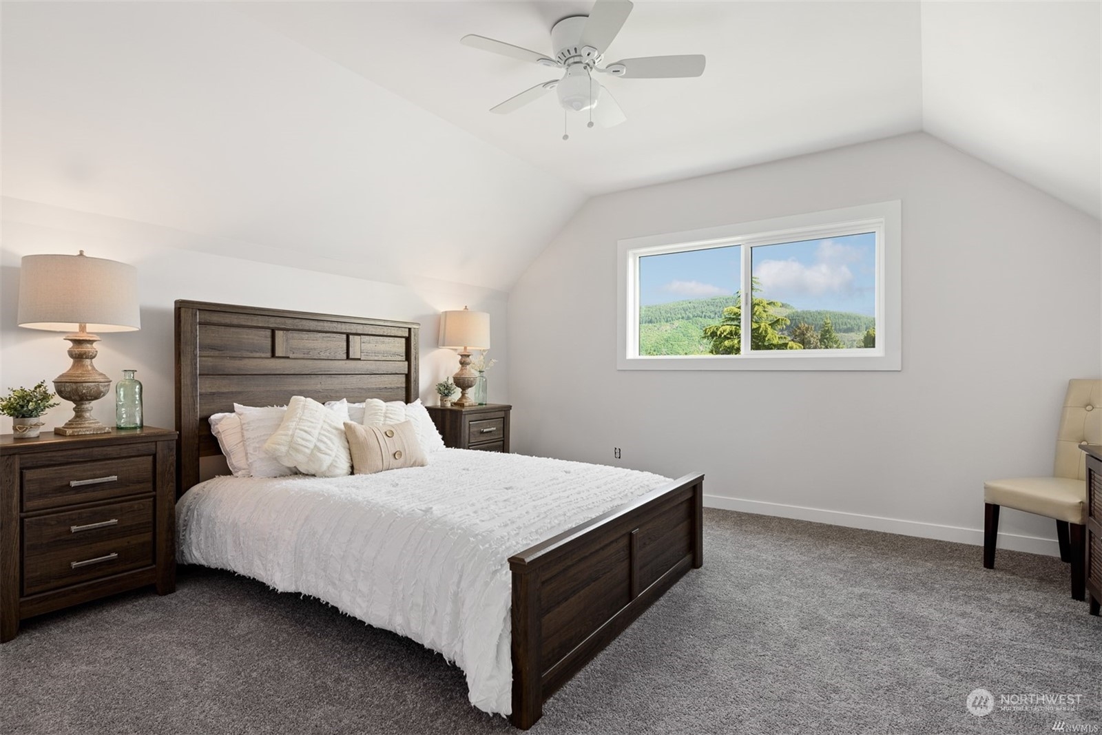 408 Nelson Street Sedro-Woolley, WA 98284 - Photo 18 of 25 a bedroom with a bed and a table