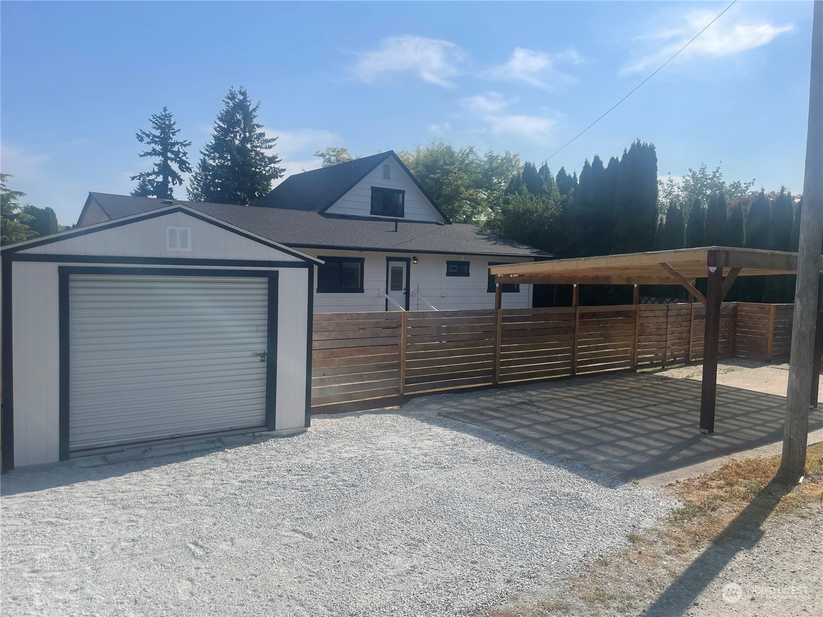 408 Nelson Street Sedro-Woolley, WA 98284 - Photo 24 of 25 a house view with a garden space