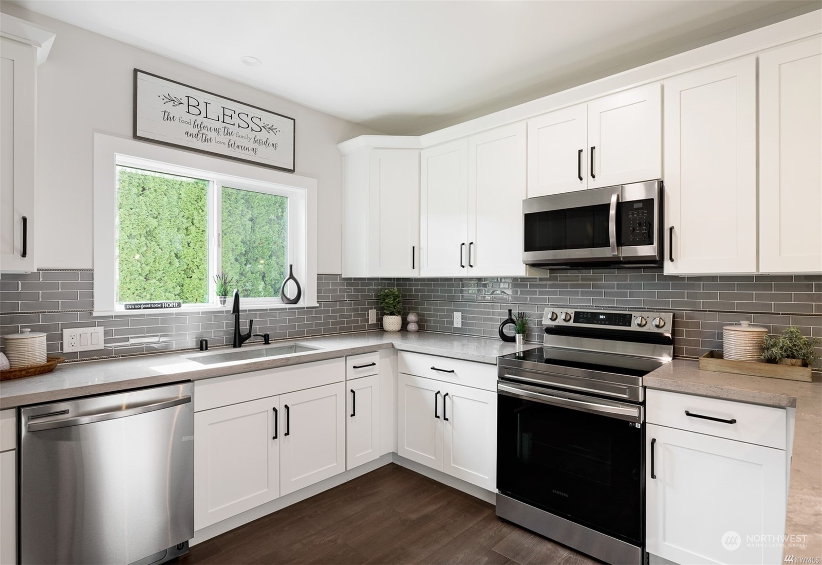 408 Nelson Street Sedro-Woolley, WA 98284 - Photo 6 of 25 a kitchen with appliances a sink and cabinets