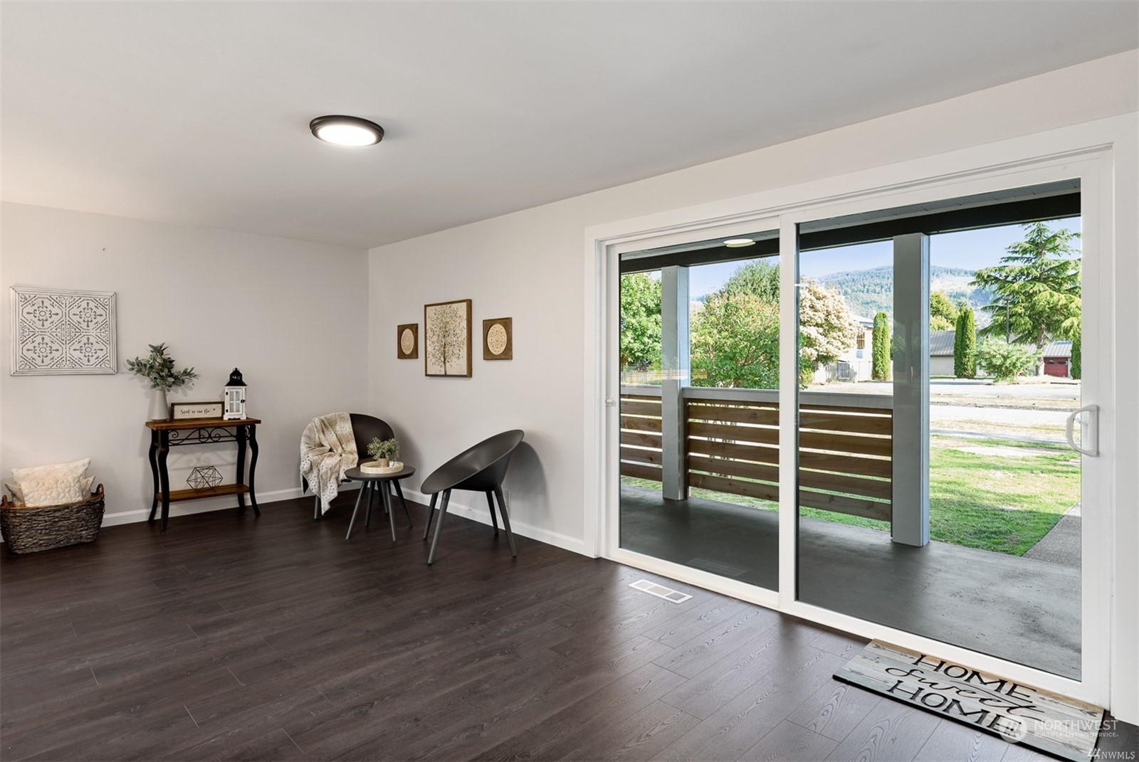 408 Nelson Street Sedro-Woolley, WA 98284 - Photo 10 of 25 a view of a livingroom with furniture and a large window